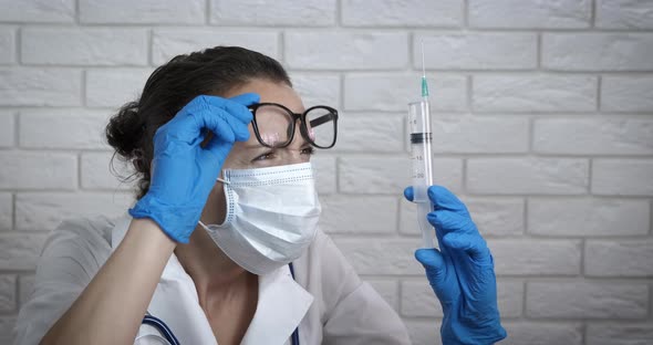 Doctor with Flu Vaccine in Hand