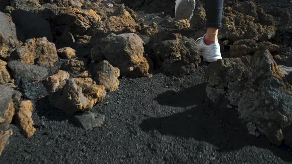 Closeup Shot of Woman Traveler Walks Through the Lava Field Around Chinyero Volcano in the Teide