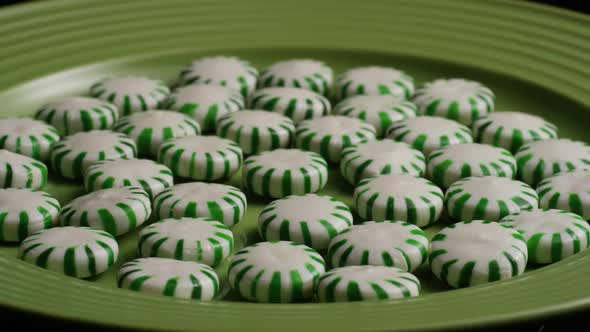 Rotating shot of spearmint hard candies - CANDY SPEARMINT 033