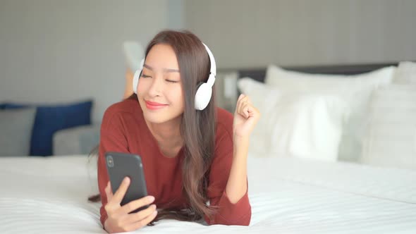 Woman use smart phone for listen music