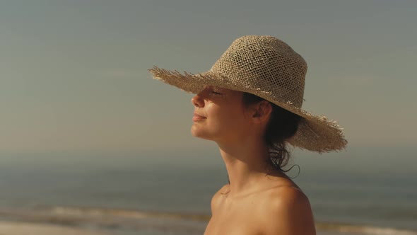 Beach Woman in Sun Hat on Vacation