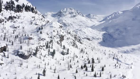 Aerial drone flight over Kaunertal in winter