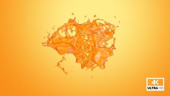 Drops Of Orange Juice Collide & Create A Splash alt
