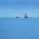 Small Sailing Yacht on the Lake Geneva and the Alps Mountains Switzerland - VideoHive Item for Sale