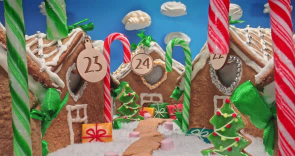 Christmas gingerbread village. Gingerbread cottages and meringue clouds.