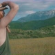 Woman With Hat Looking To Mountains - VideoHive Item for Sale