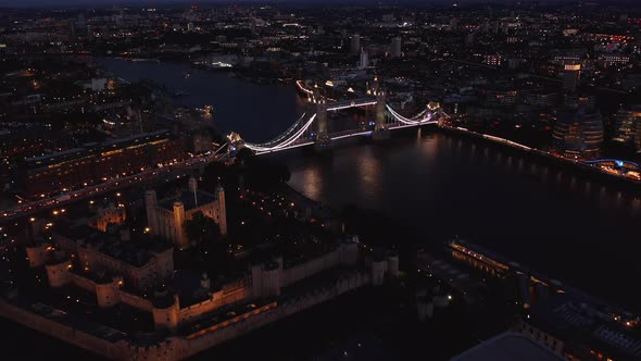 Aerial Night View of Tower of London Castle and Tower Bridge