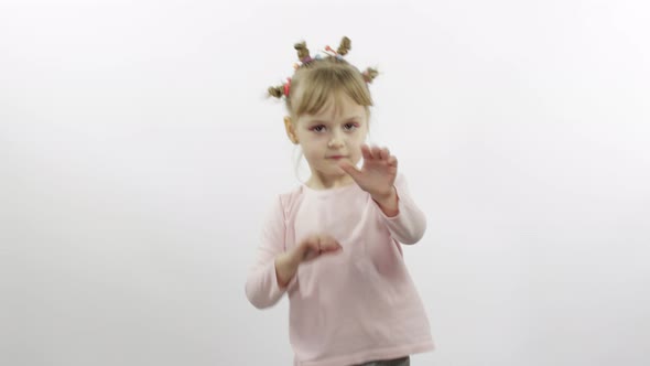 Positive Girl in Pink Blouse Dancing, Happy Four Little Child, White Background