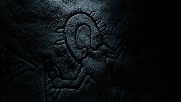 Carving Of Ancient Alien Visitor On Cave Wall