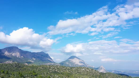 Panoramic Drone View of Green Mountain Peaks on a Summer Day