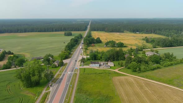 cars on an asphalt road with a beautiful landscape. footage 4K. Drone clips on the Highway in Lithua