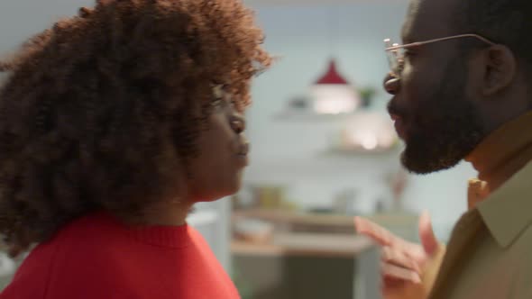 Furious African American Couple Fighting at Home