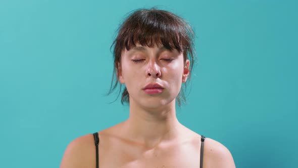 Portrait of Athletic Woman Breathing and Relaxing After Workout Training