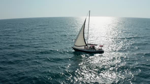 Yacht Sailing on Opened Sea. Sailing Boat. Yacht From Drone. Yachting Video. Yacht From Above