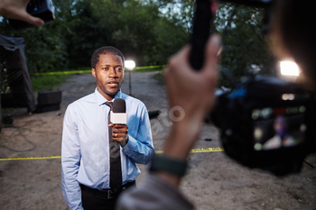 Policeman Giving Comment at Crime Scene