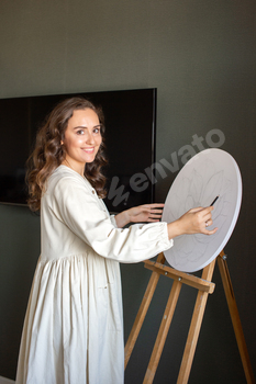 Artist Sketching a Floral Composition on Canvas