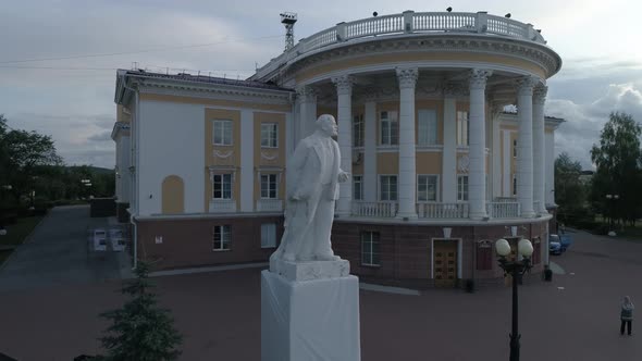 Aerial view of beautiful house of culture and Lenin monument. Summer, evening 24