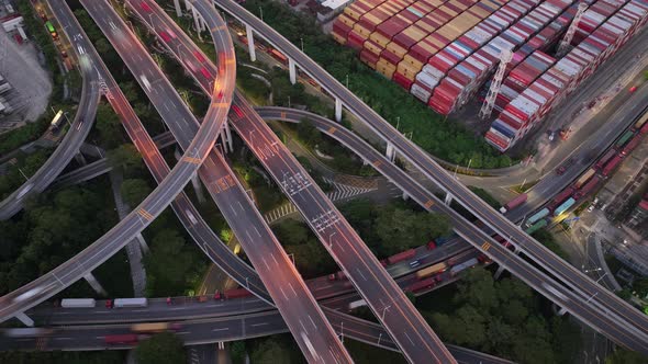 Aerial footage of  traffic on modern viaducts in Shenzhen city, China alt