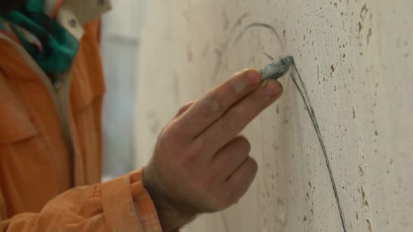 Sculptor Drawing Stone