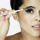 Woman using eyebrow comb - VideoHive Item for Sale