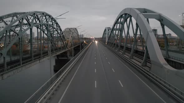 Early Morning Empty Bridge With A City Bus