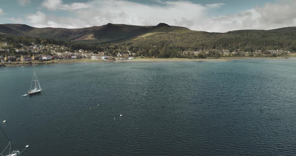 Atlantic Ocean Gulf Sailboats Aerial Zooming Shot in Brodick Bay alt