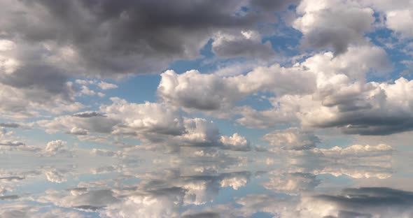 Futuristic Background Consisting of Time Lapse Clip of White Fluffy Clouds Over Blue Sky and Their