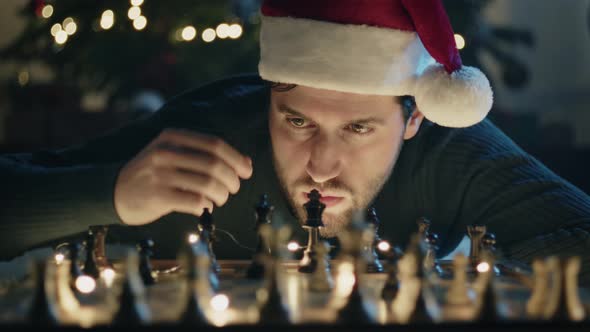 Boy Plays Chess on Christmas Mood