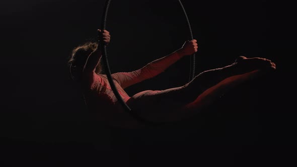 Silhouette of Aerial Acrobat in the Air Ring