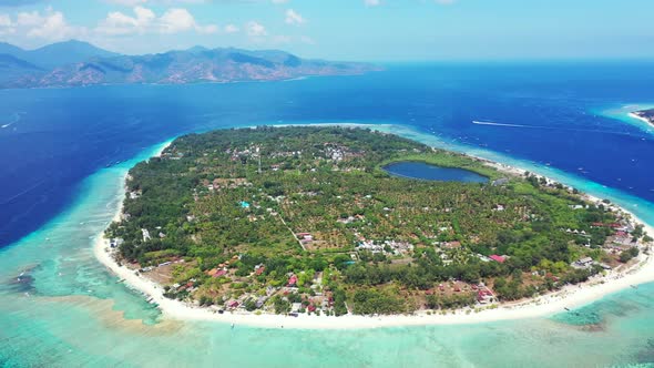 Aerial view texture of tranquil shore beach journey by blue sea with white sand background of a dayo