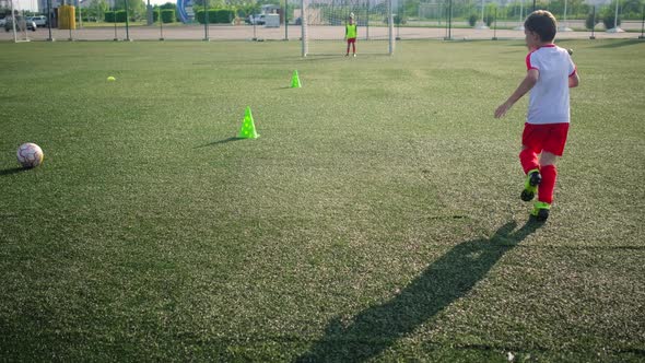 Boys Footballers Are Passing Ball and Kicking Goal