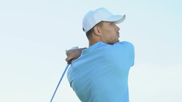 Man Golfer Making Short-Distance Shot to Land Ball on Green, Luxury Hobby