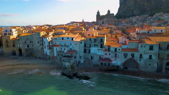 Sandy Beach and Blue Sea in Cefalu Town in Italian Metropolitan City of Palermo Located on