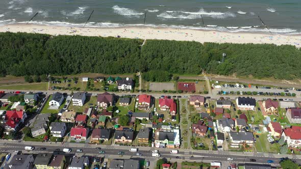 Baltic Sea, Aerial View of Chalupy city in Poland Sandy Beaches. Hel. People on the beach. Waves