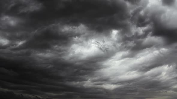 Cloudscape time lapse. Gray and blue. 2 videos in one file. Clouds passing by. No flicker.