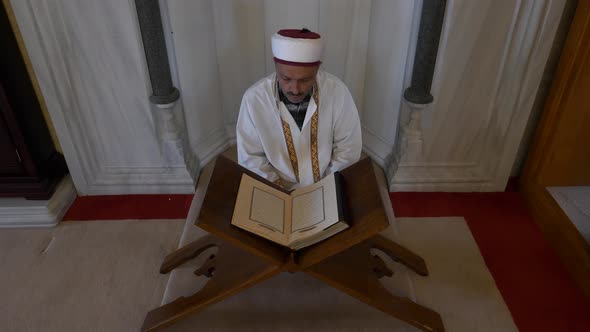 Imam Reading Quran In Mosque