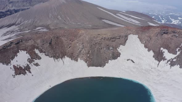 The Blue Lake in the Crater of Gorely Volcano