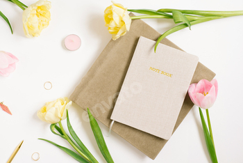 Women's Workplace with Notebook, Pink and Yellow Tulip Flowers, Pen, Notebooks