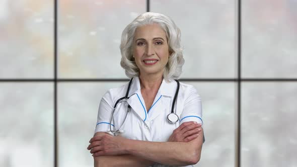 Pretty Female Doctor Looking at Camera