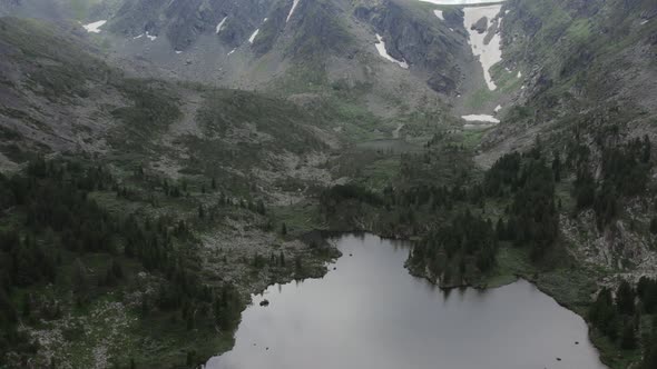 Karakol lakes and green forest in mountains of Altai