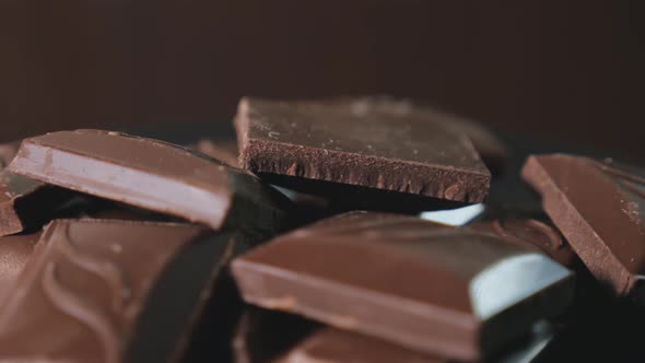 Pieces of Dark Chocolate on a Rotating Platform