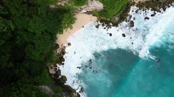 Aerial drone video of Tembeling beach on Nusa Penida Island in Bali Indonesia