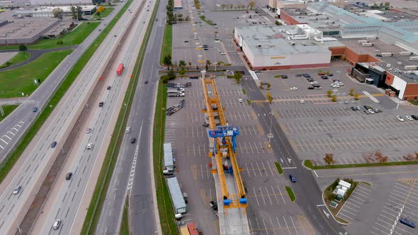 4K camera drone view of the construction site of the Metropolitan Express Network in Montreal.