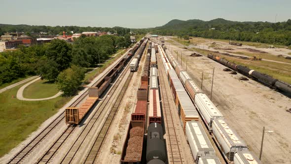 Aerial Video Industrial Cargo Train On Tracks Etowah Tennessee