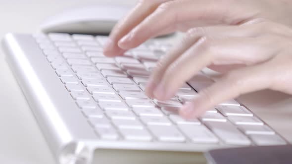 Business Woman Wear Glasses And Typing On Laptop In Office