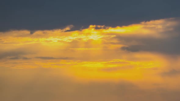 Time Lapse Footage of Fast Moving Evening Clouds on Yellow Sky at Sunset