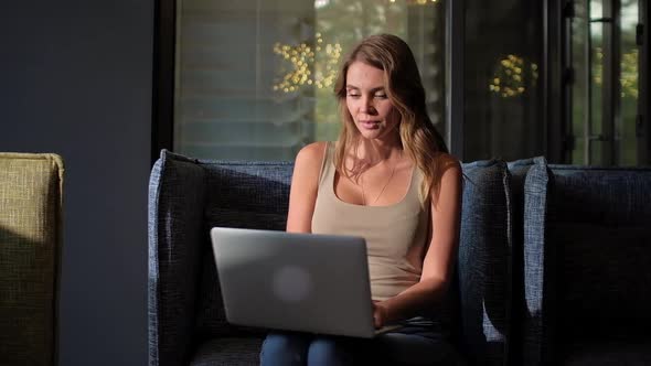 Businesswoman Working in Office Typing at Laptop