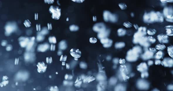 Water Pouring Into Tank Of Water With Bubbles Rising