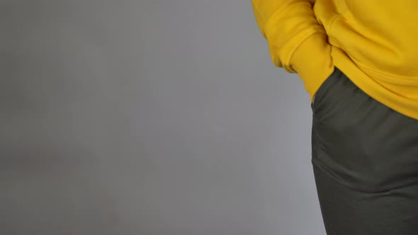 Close Up of Unrecognizable Woman Put Hand in Her Pocket of Pants