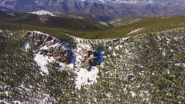 4K Drone Footage Flying Above Circling Around Snowy Alpine Mountain Top Summit In Mount Evans Rocky